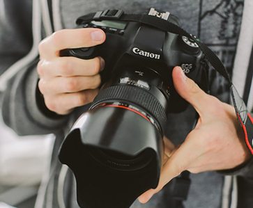 Camera in a photographer’s hands